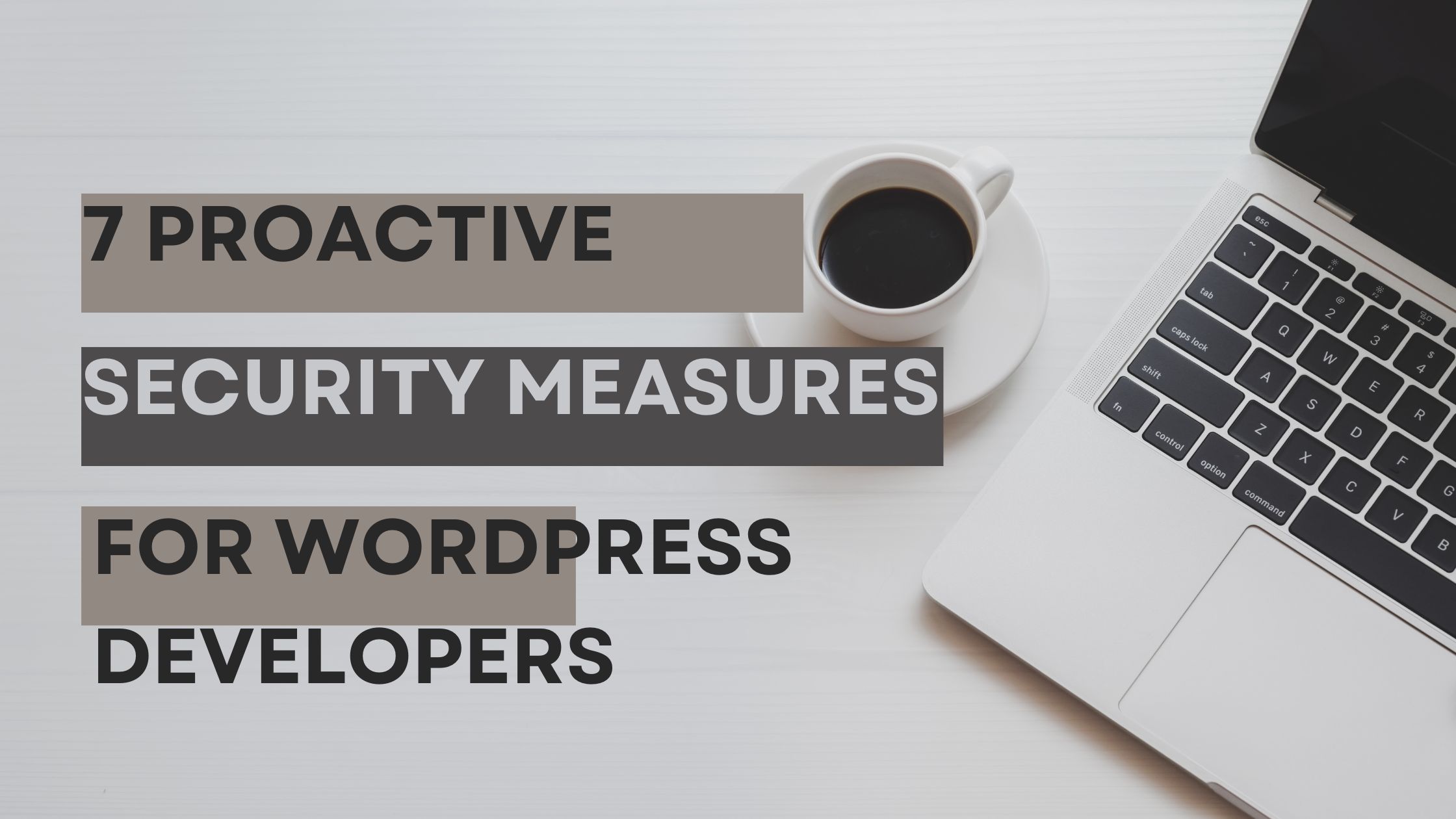 WordPress developer working on website security measures on a laptop.